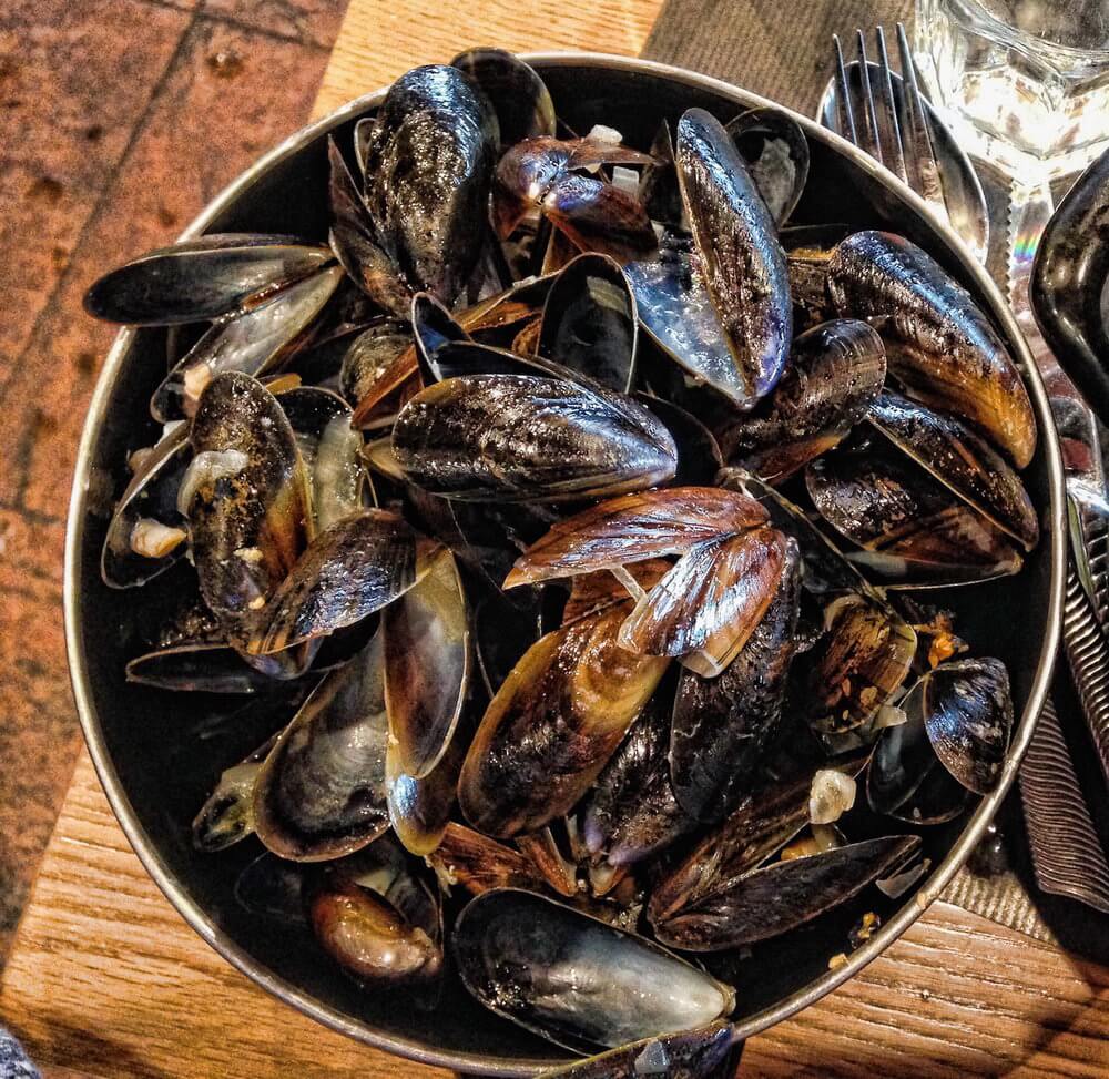 How to eat mussels: A huge pot of empty mussel shells